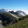 Scorcio di paesaggio nel Parco Nazionale Dolomiti Bellunesi con vista sulla catena delle Vette Feltrine e sullo sfondo il gruppo roccioso del Cimonega. Un territorio ricco di biodiversità e di notevole interesse biogeografico che ospita molte interessanti specie licheniche.